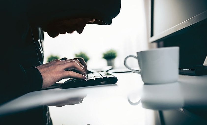 computer hacker working in web